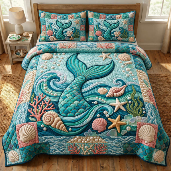 Coastal Whisper in Gray quilted bedding set, quilt and two pillow shams on a made bed