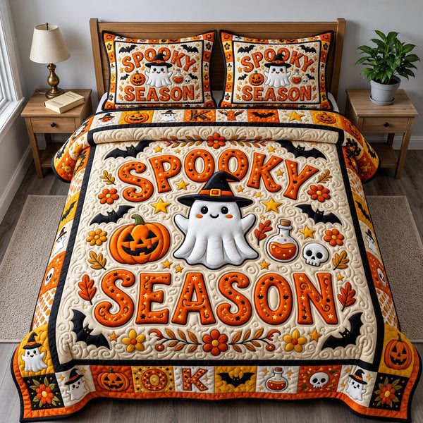 Haunted Halloween in Blush quilted bedding set, quilt and two pillow shams on a made bed