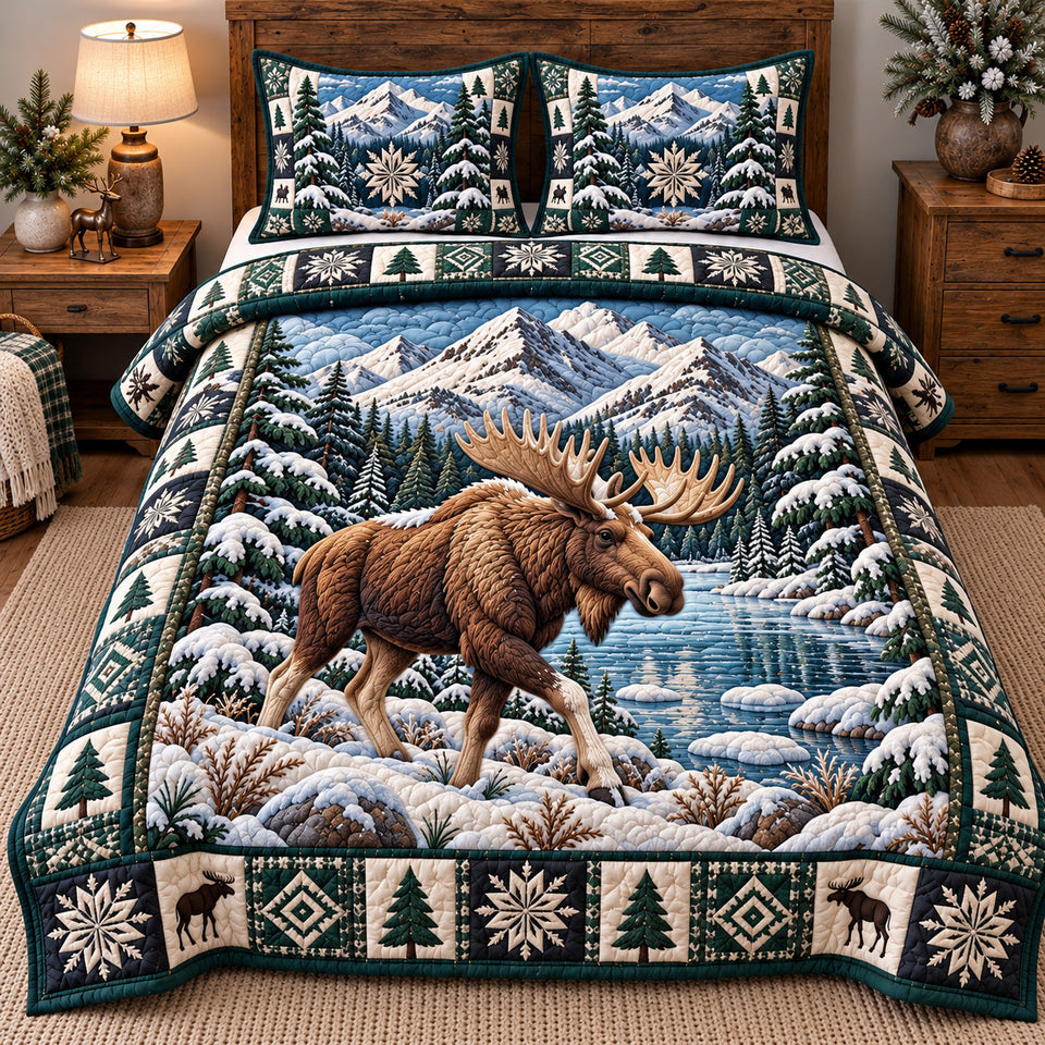Alpine Moose Wanderer quilted bedding set, quilt and two pillow shams on a made bed