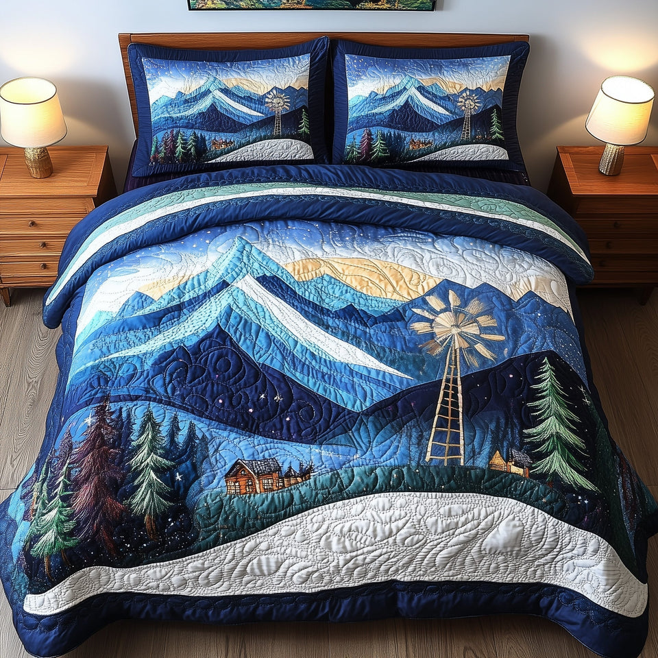 Alpine Windmill Nightfall quilted bedding set, quilt and two pillow shams on a made bed
