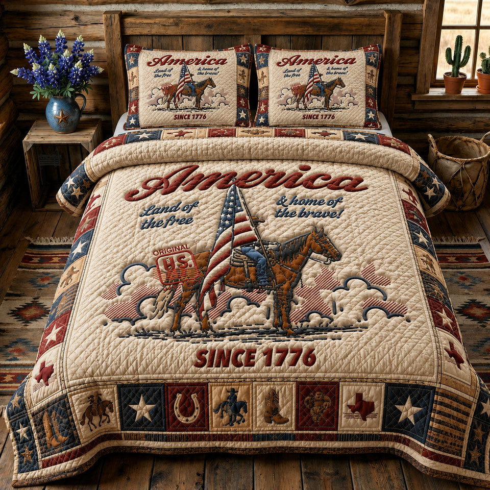 America Land Of The Free quilted bedding set, quilt and two pillow shams on a made bed