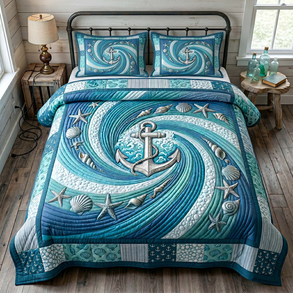 Anchor Ocean Swirl quilted bedding set, quilt and two pillow shams on a made bed