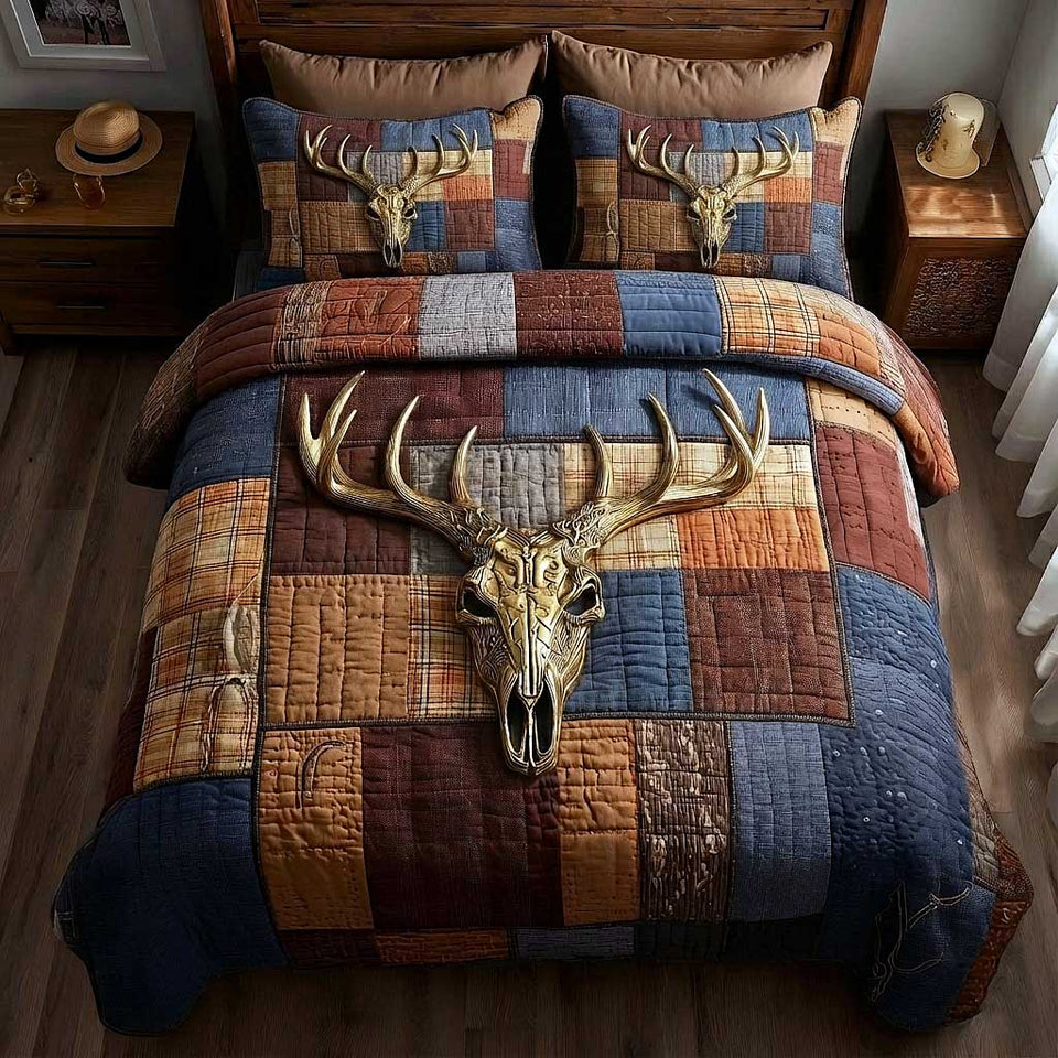 Antler Skull Patch Trail quilted bedding set, quilt and two pillow shams on a made bed