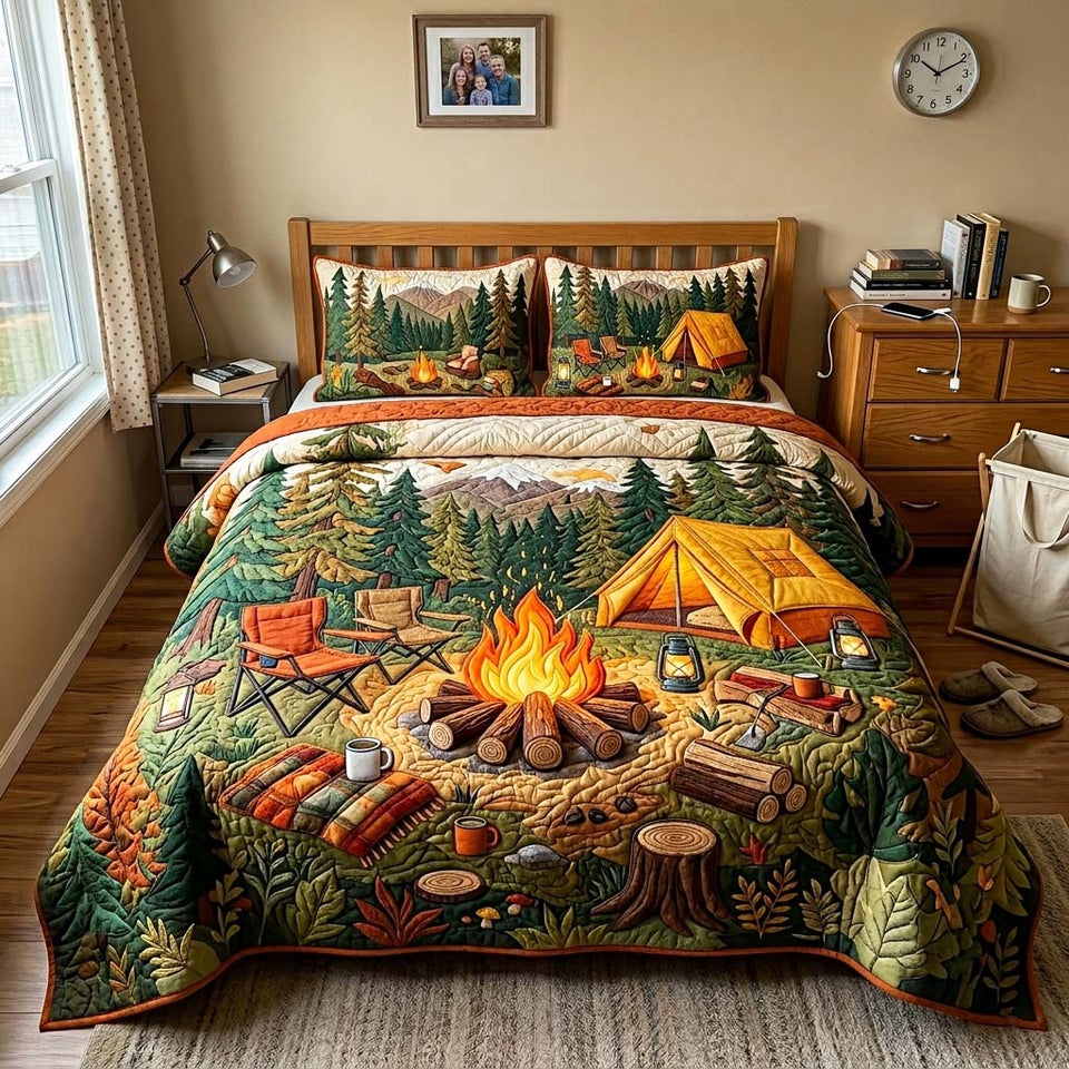 Autumn Campfire quilted bedding set, quilt and two pillow shams on a made bed