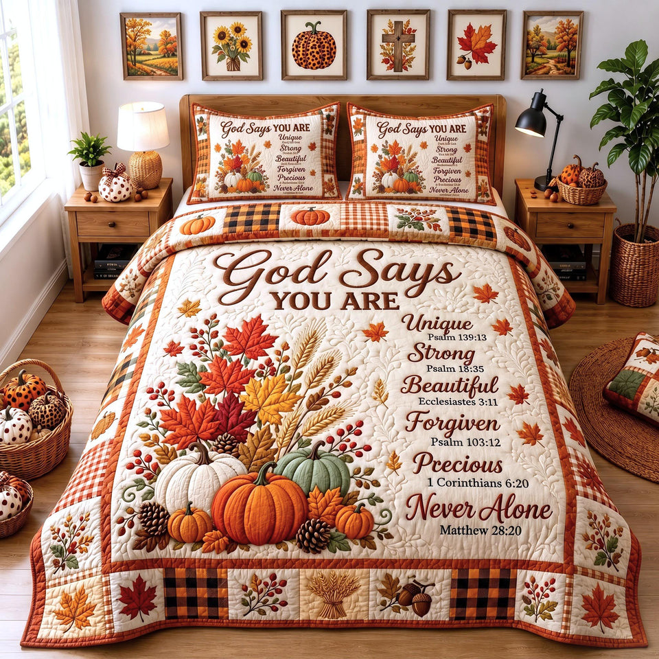 Autumn Scripture quilted bedding set, quilt and two pillow shams on a made bed