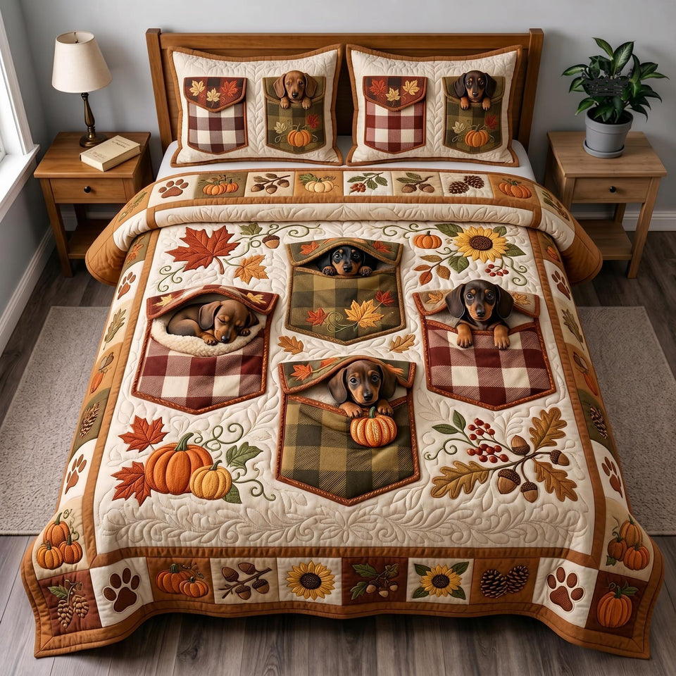 Autumn Wiener quilted bedding set, quilt and two pillow shams on a made bed