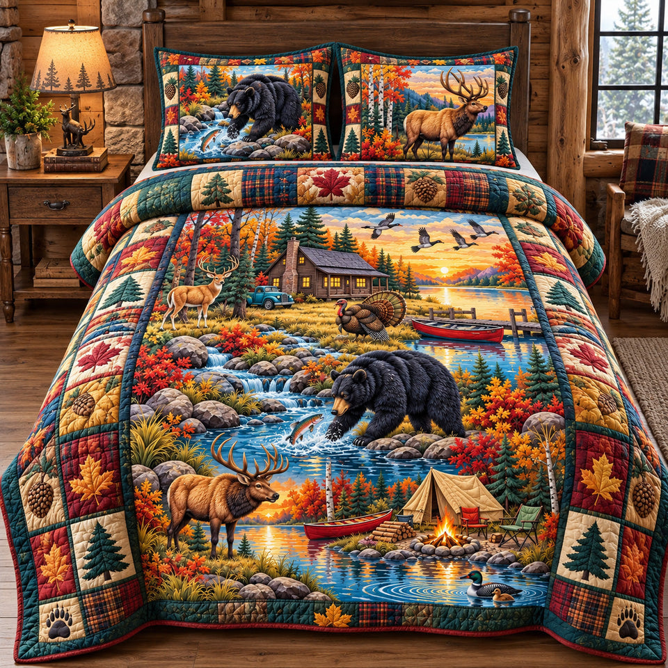 Autumn Wilderness Adventure quilted bedding set, quilt and two pillow shams on a made bed