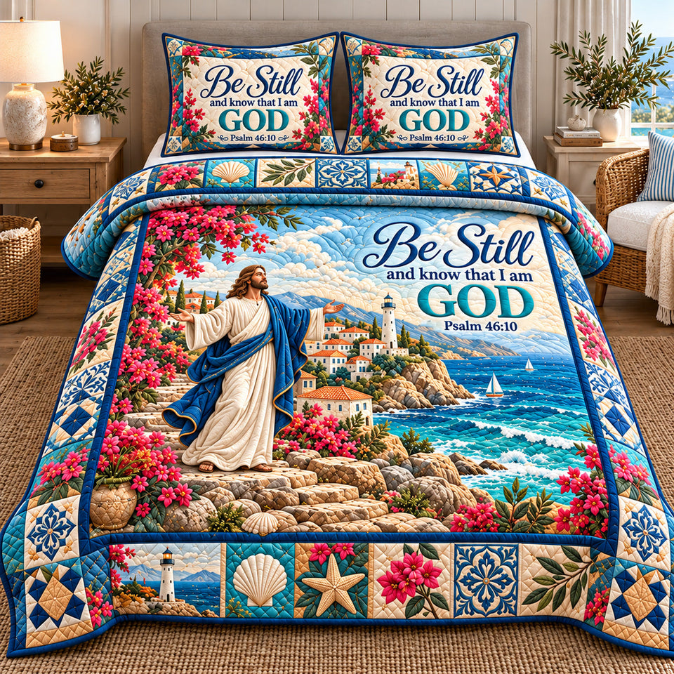 Be Still And Know in Tan quilted bedding set, quilt and two pillow shams on a made bed