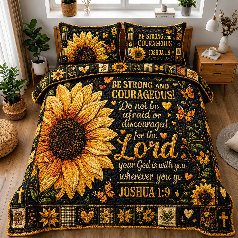 Be Strong and Courageous Sunflower quilted bedding set, quilt and two pillow shams on a made bed