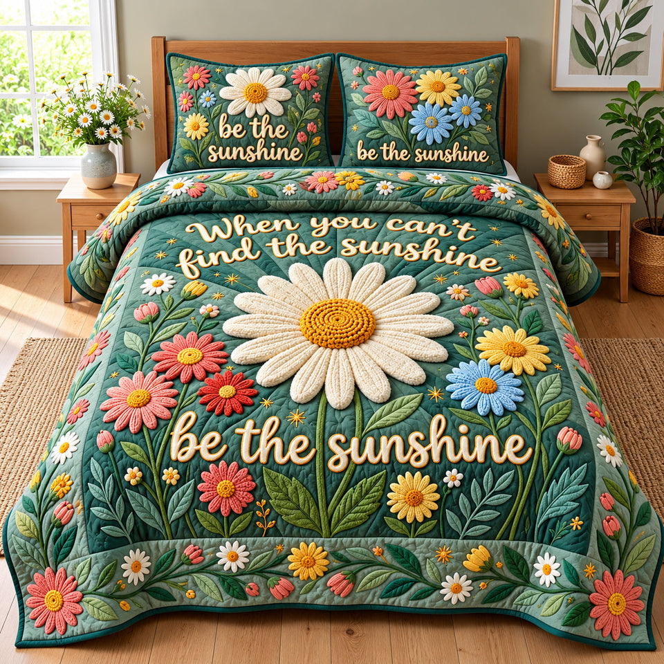 Be The Sunshine quilted bedding set, quilt and two pillow shams on a made bed