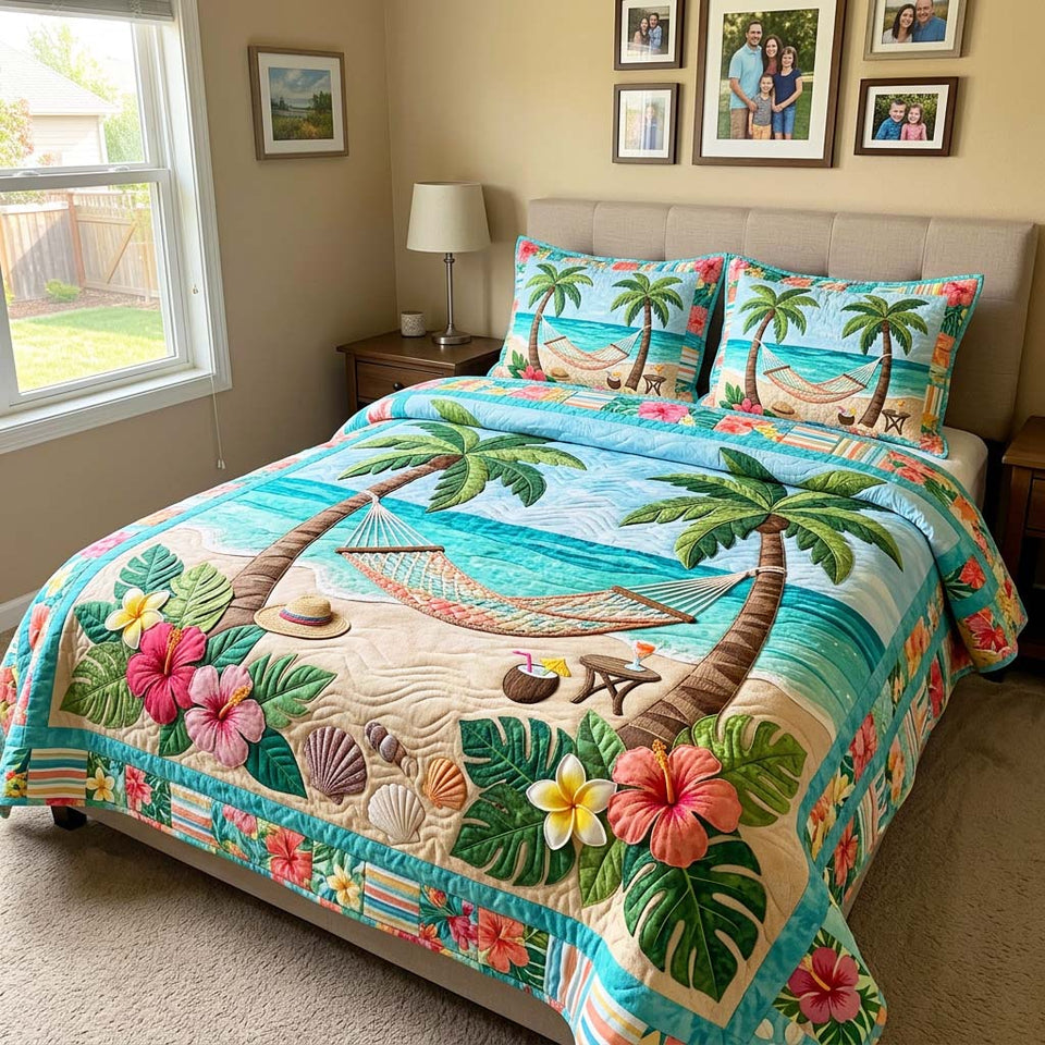 Beach Hammock quilted bedding set, quilt and two pillow shams on a made bed