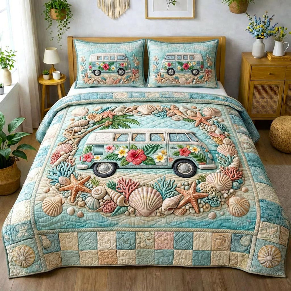 Beachside quilted bedding set, quilt and two pillow shams on a made bed