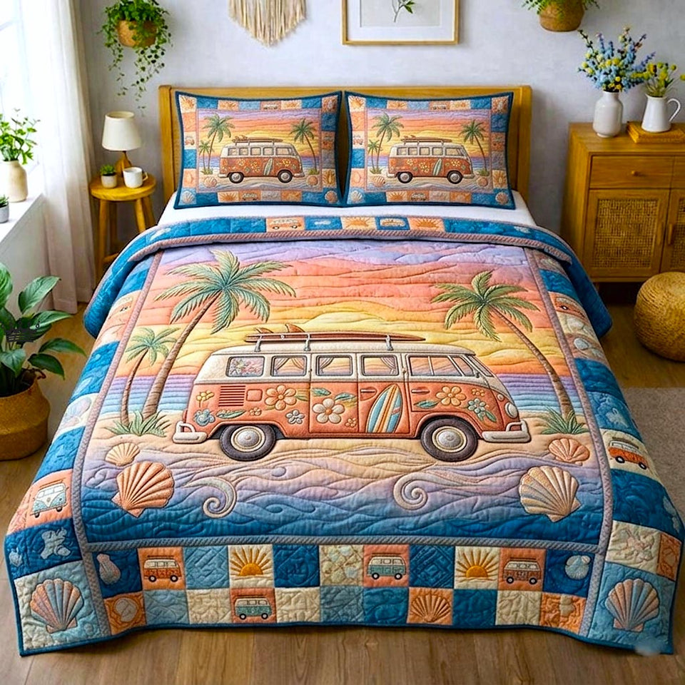 Beachside Sea quilted bedding set, quilt and two pillow shams on a made bed