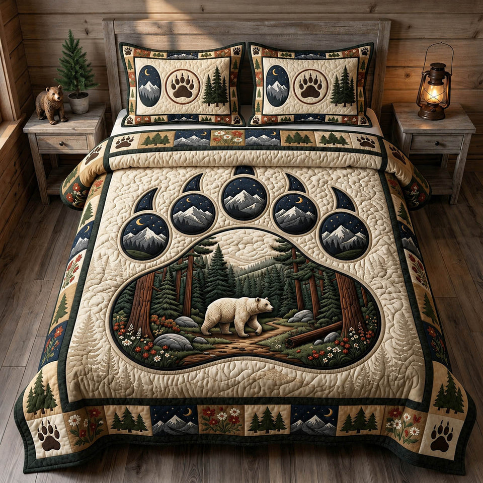 Bear Spirit Forest Scene Inside a Paw Print quilted bedding set, quilt and two pillow shams on a made bed