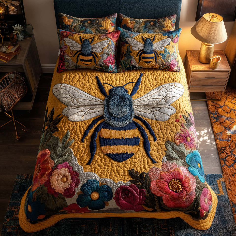 Bee Heaven Folk Flowers On Yellow quilted bedding set, quilt and two pillow shams on a made bed
