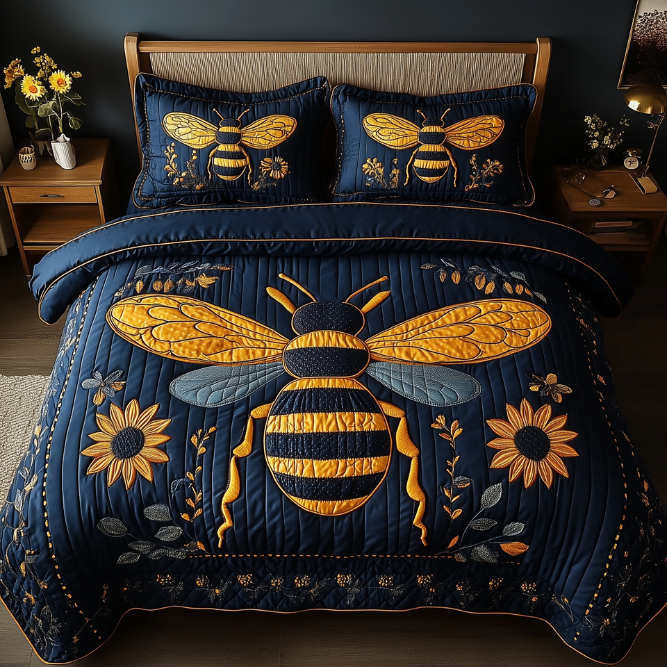 Bee Positive Framed By Leaves And Blooms quilted bedding set, quilt and two pillow shams on a made bed