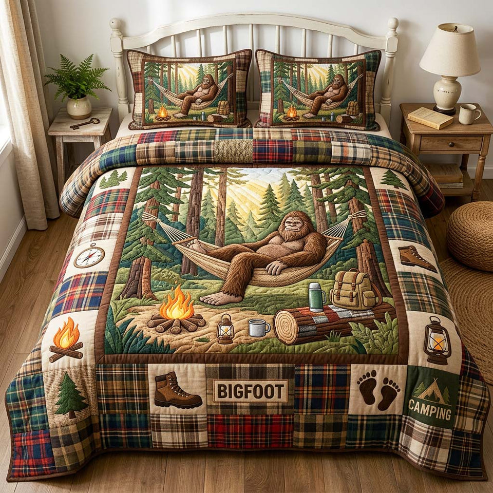 Bigfoot Hammock Forest Nap quilted bedding set, quilt and two pillow shams on a made bed