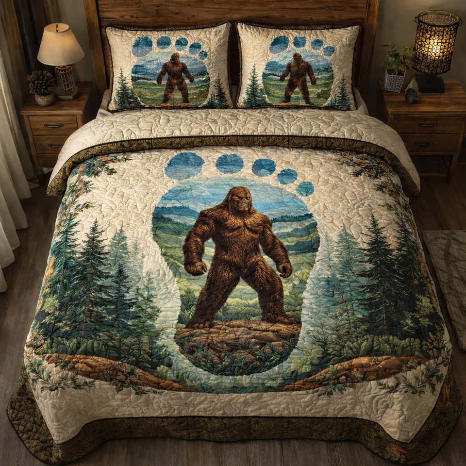 Bigfoot Paw Emblem quilted bedding set, quilt and two pillow shams on a made bed