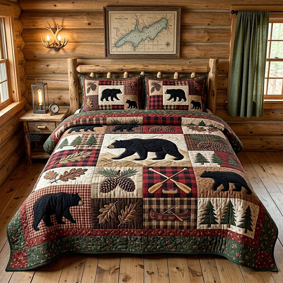 Black Bear Lodge Patches quilted bedding set, quilt and two pillow shams on a made bed