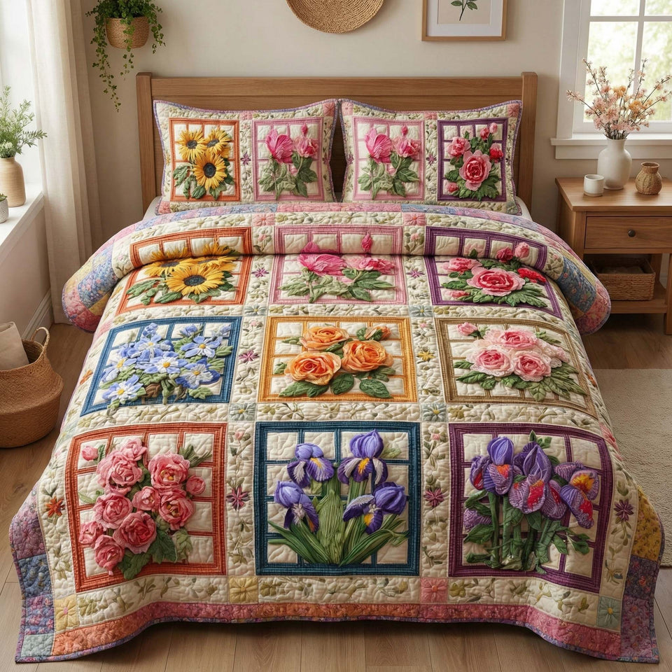 Blossom Grace Framed Flower Squares quilted bedding set, quilt and two pillow shams on a made bed