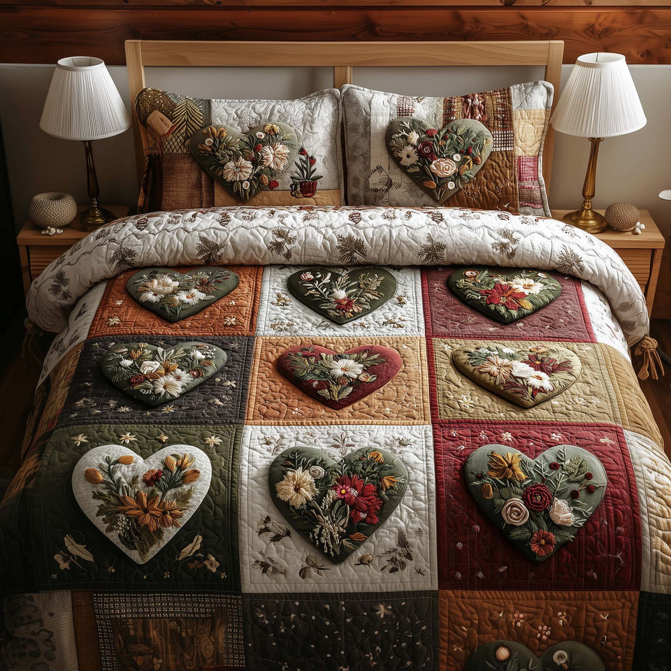Blossom Heart Patchwork Hearts on Earthy Squares quilted bedding set, quilt and two pillow shams on a made bed