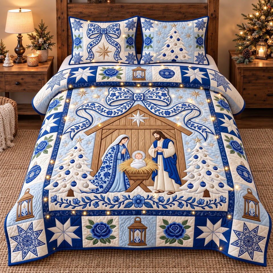 Blue Floral Nativity quilted bedding set, quilt and two pillow shams on a made bed