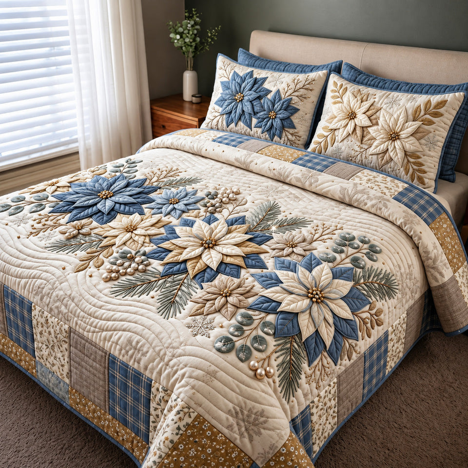 Blue Floral quilted bedding set, quilt and two pillow shams on a made bed