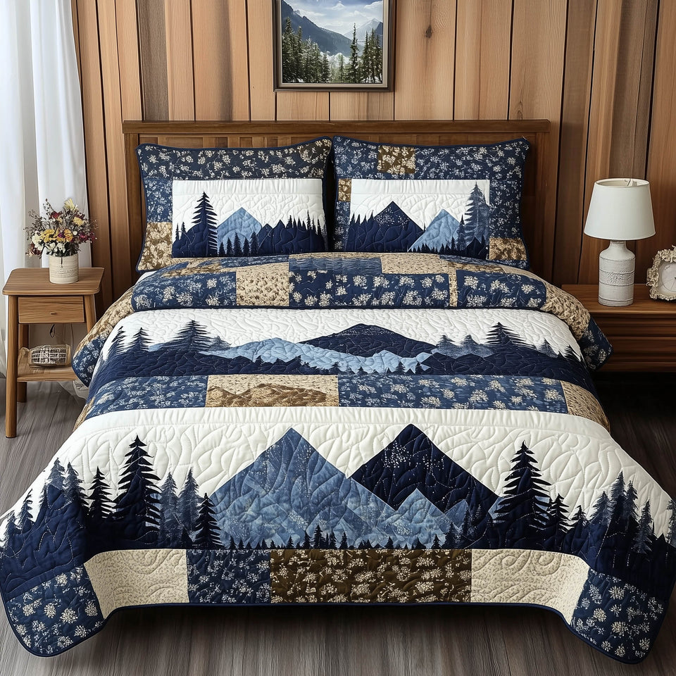Blue Mountain Pieced Blocks With Pine Silhouettes quilted bedding set, quilt and two pillow shams on a made bed