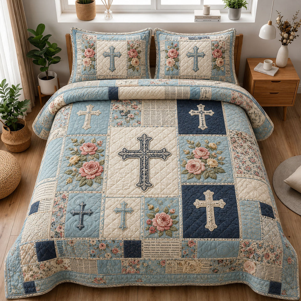 Blue Rose Cross Christian Patchwork quilted bedding set, quilt and two pillow shams on a made bed