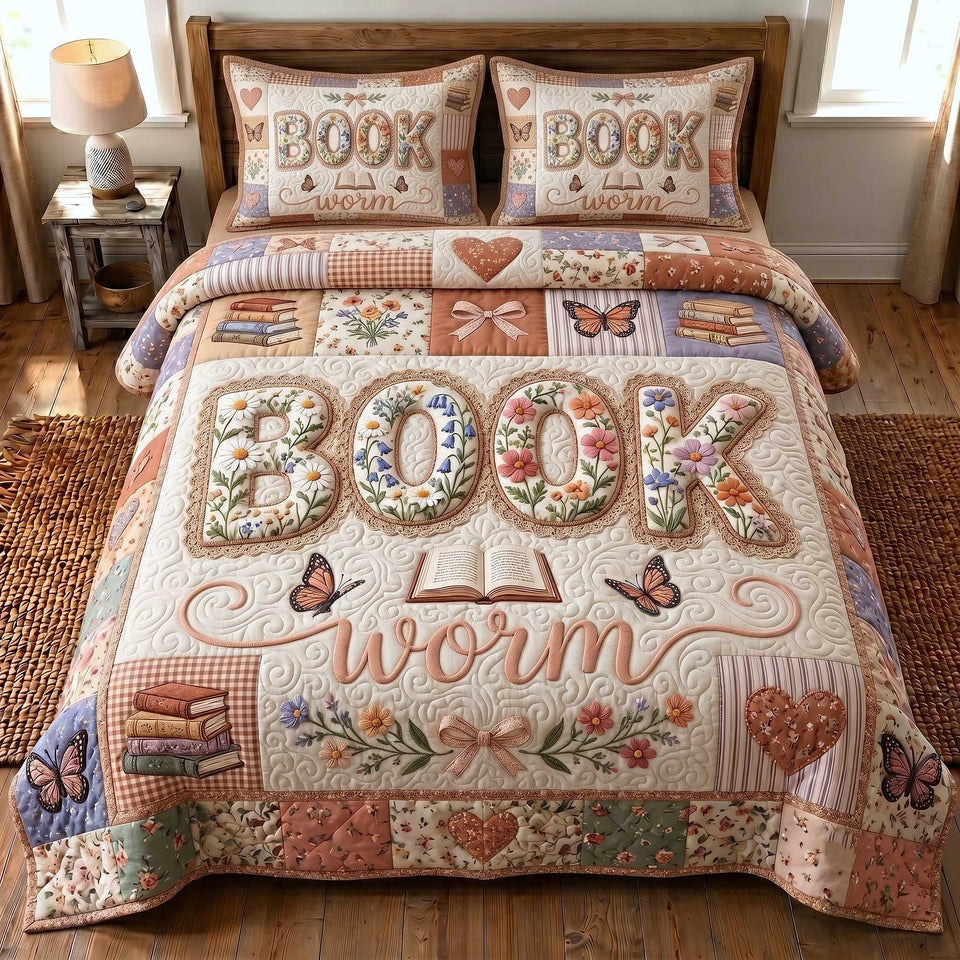 Bookish Soul Bookworm Letters on Cream quilted bedding set, quilt and two pillow shams on a made bed