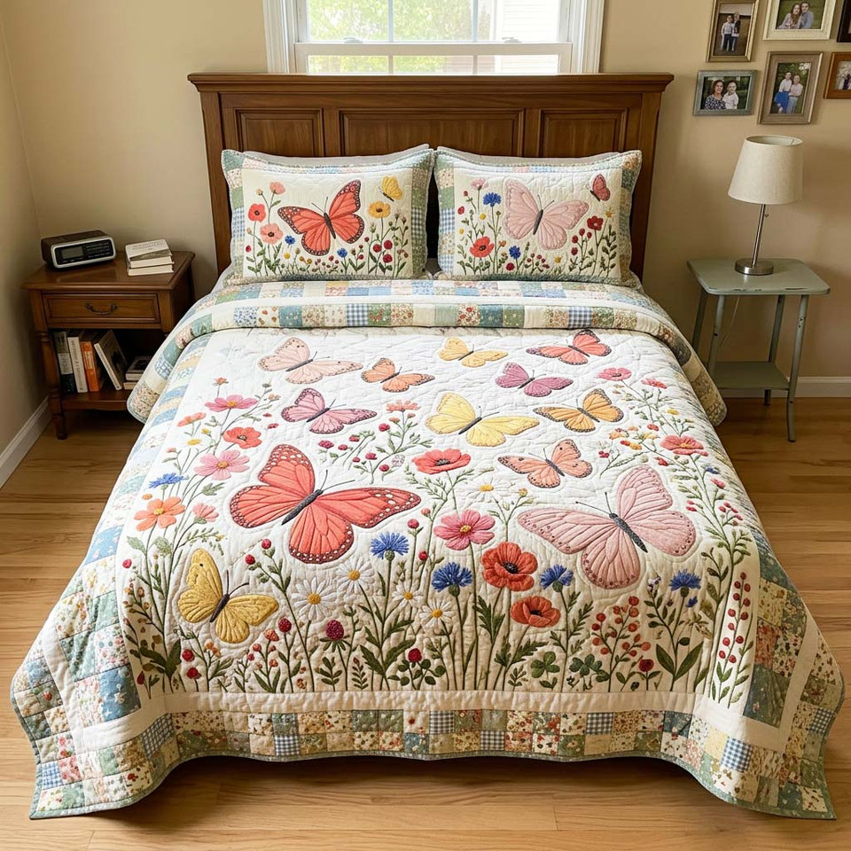 Butterfly Wildflower Soft Meadow quilted bedding set, quilt and two pillow shams on a made bed