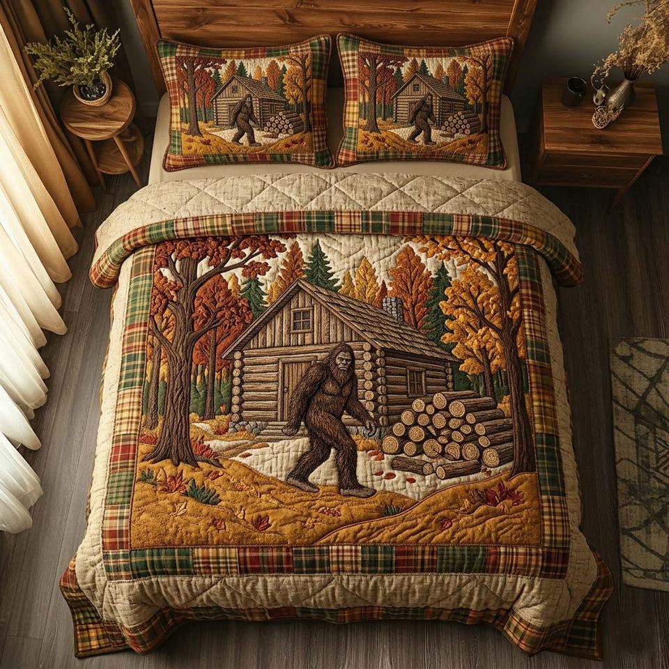 Cabin Path Bigfoot quilted bedding set, quilt and two pillow shams on a made bed
