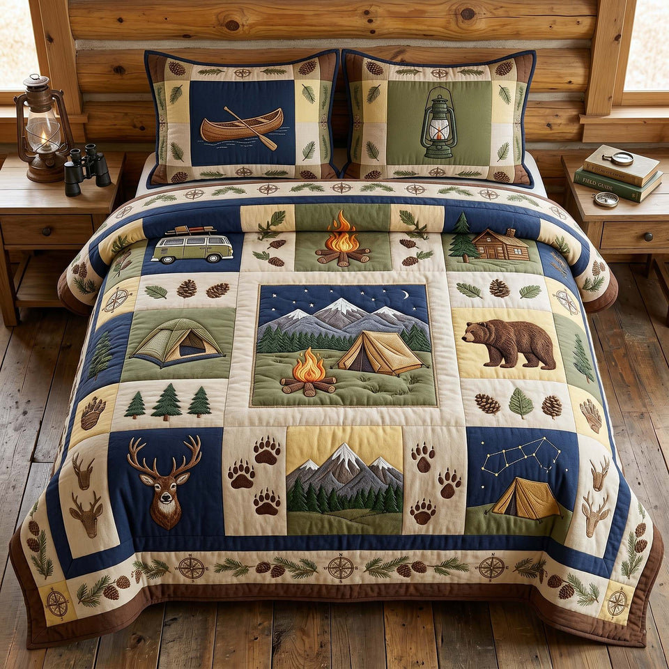 Camp Escape quilted bedding set, quilt and two pillow shams on a made bed