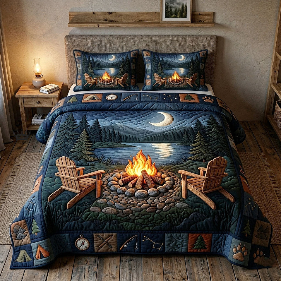Camp Life Fire Ring Under the Crescent Moon quilted bedding set, quilt and two pillow shams on a made bed