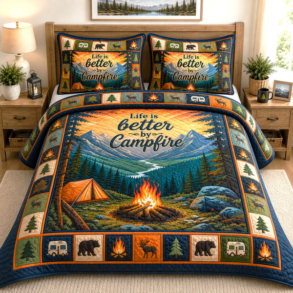 Campfire quilted bedding set, quilt and two pillow shams on a made bed