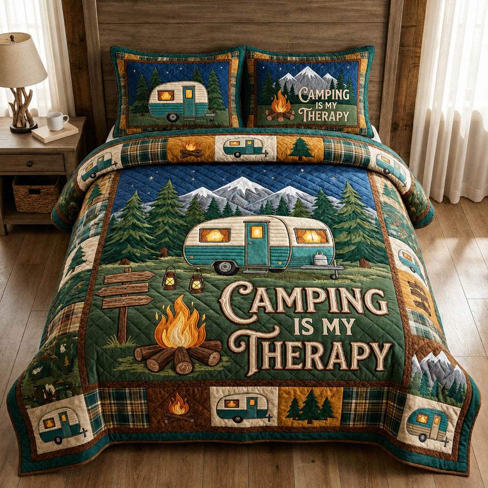 Camping Therapy quilted bedding set, quilt and two pillow shams on a made bed