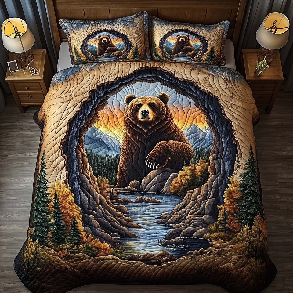 Canyon Bear quilted bedding set, quilt and two pillow shams on a made bed