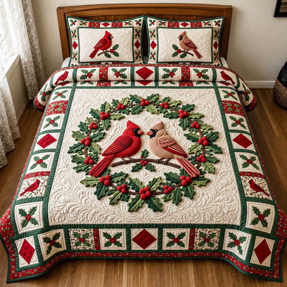 Cardinal Pair Holly Wreath quilted bedding set, quilt and two pillow shams on a made bed