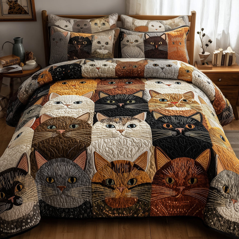 Cat Faces in Earthy Patchwork Squares quilted bedding set, quilt and two pillow shams on a made bed