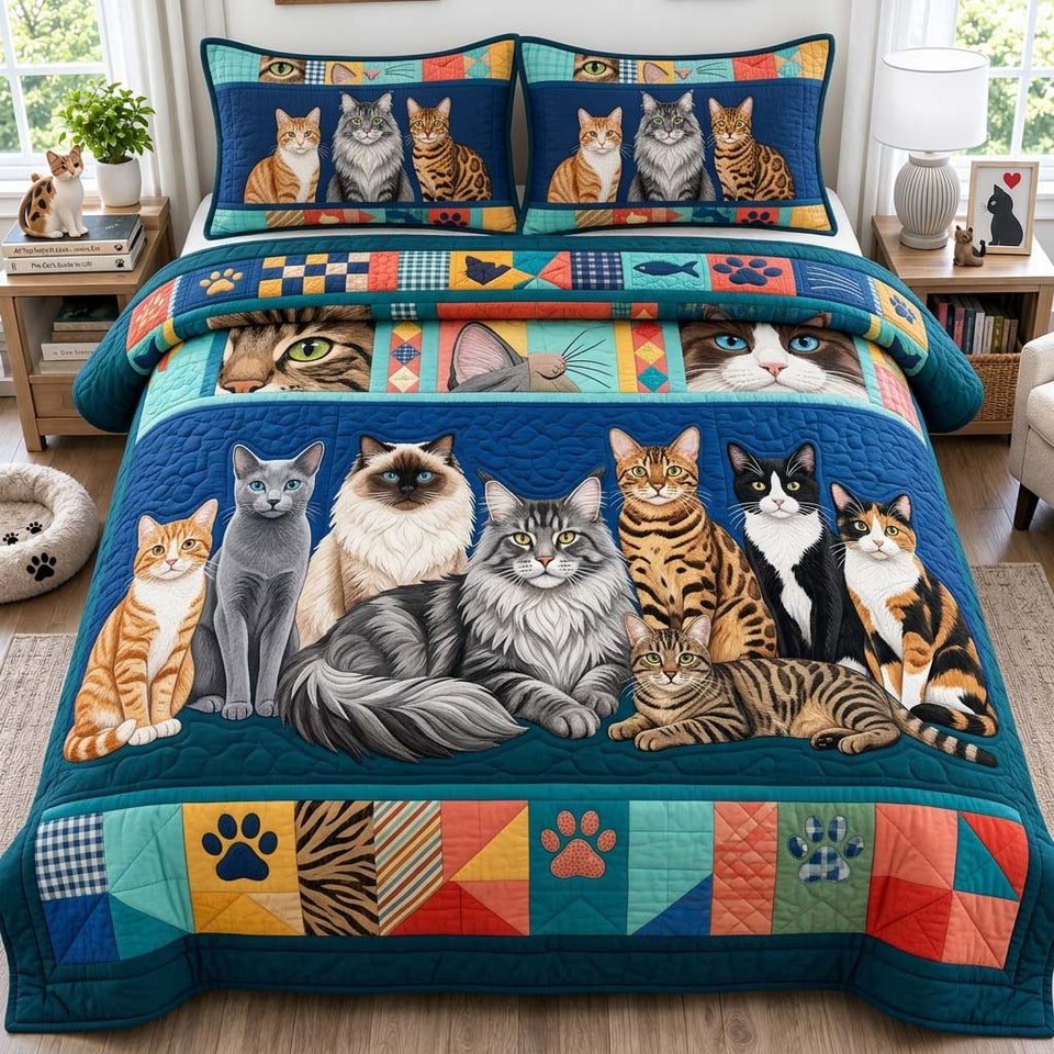 Cat Family quilted bedding set, quilt and two pillow shams on a made bed