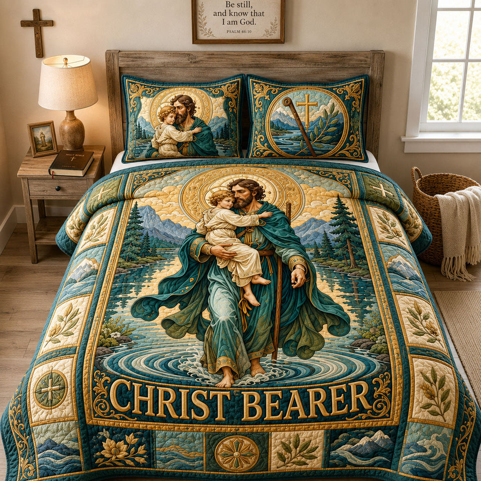 Christ Bearer Embrace Of Faith quilted bedding set, quilt and two pillow shams on a made bed