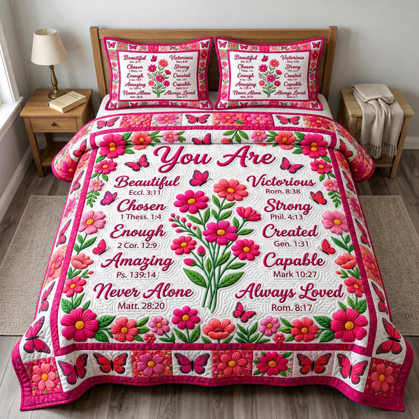 Christian Faith in Pink quilted bedding set, quilt and two pillow shams on a made bed