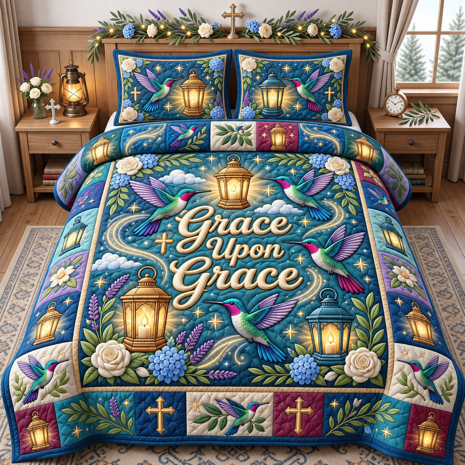 Christian Hummingbird Faith Inspired quilted bedding set, quilt and two pillow shams on a made bed