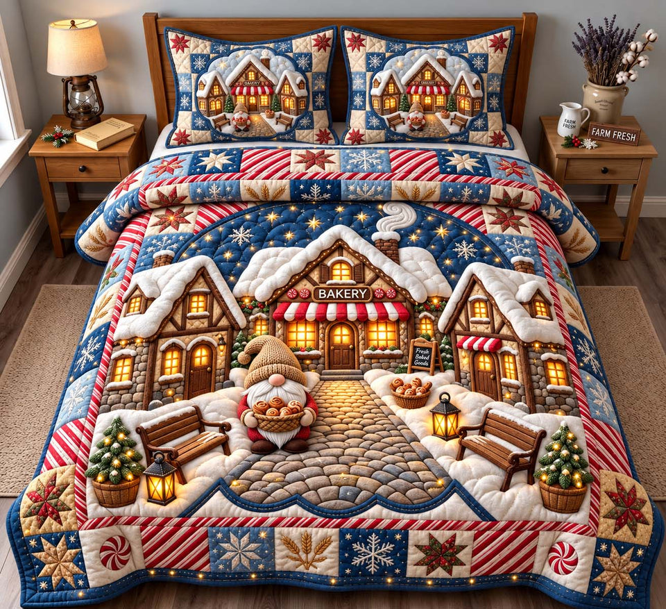 Christmas Bakery Village quilted bedding set, quilt and two pillow shams on a made bed