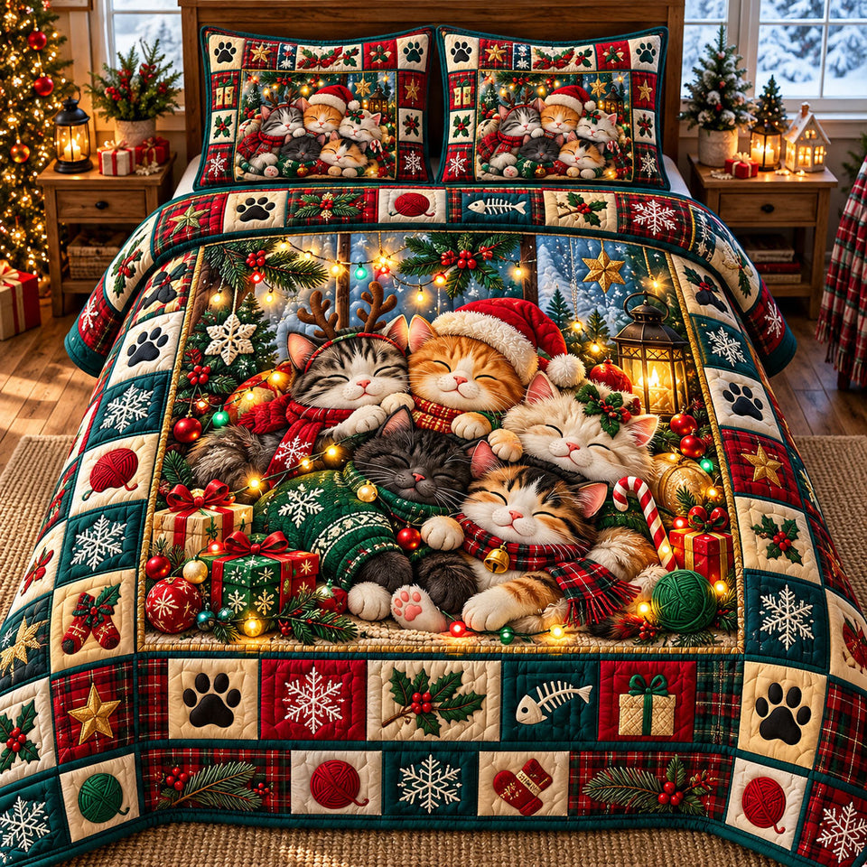 Christmas Cat in Black and Brown quilted bedding set, quilt and two pillow shams on a made bed