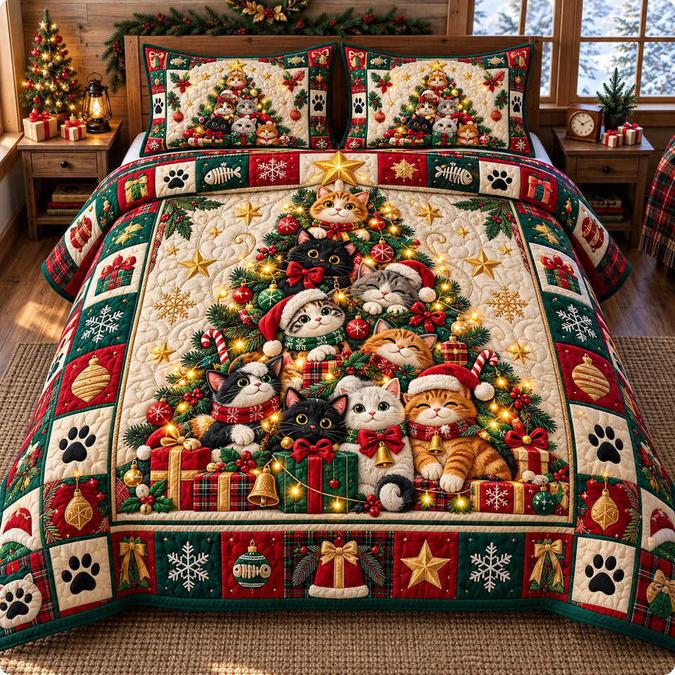 Christmas Cat in Brown and Burgundy quilted bedding set, quilt and two pillow shams on a made bed