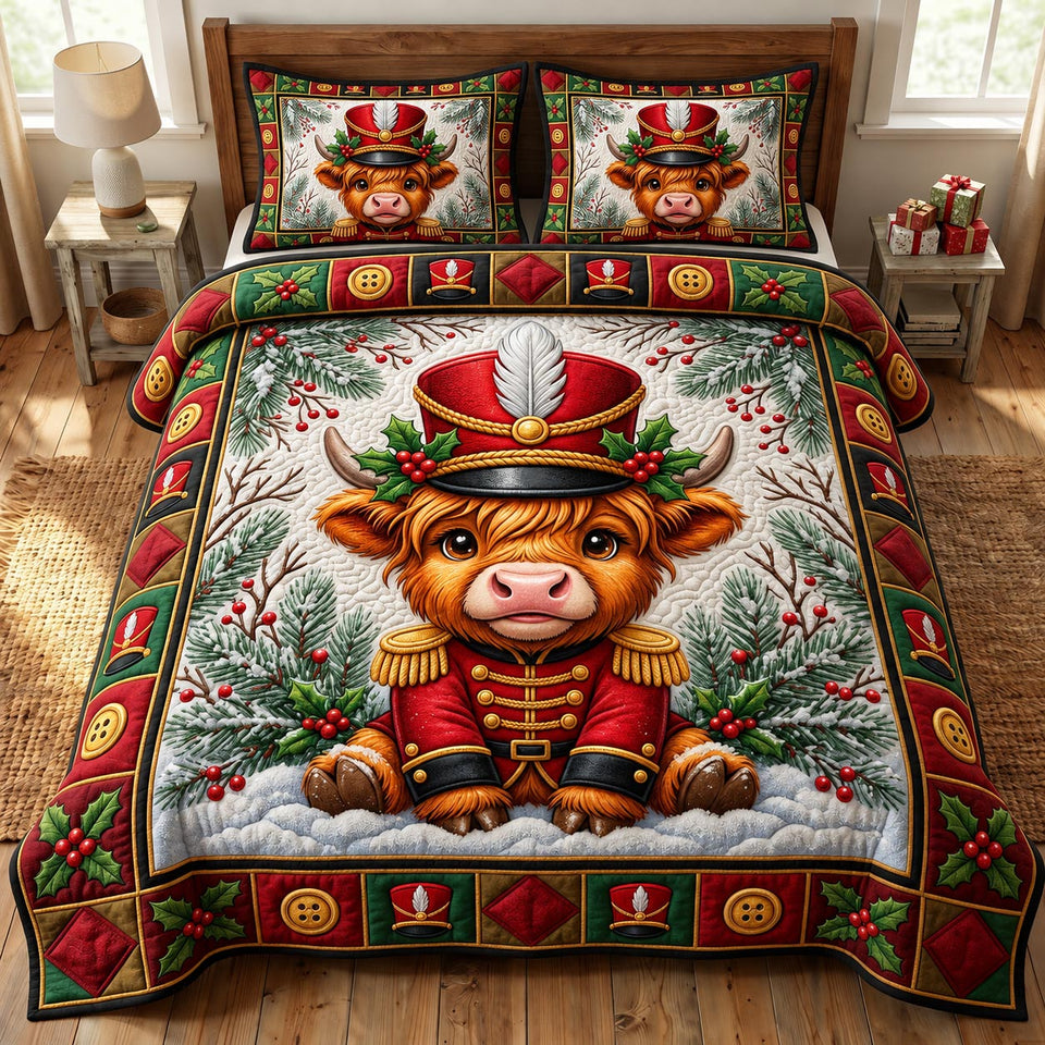 Christmas Highland Cow Christmas Decor quilted bedding set, quilt and two pillow shams on a made bed