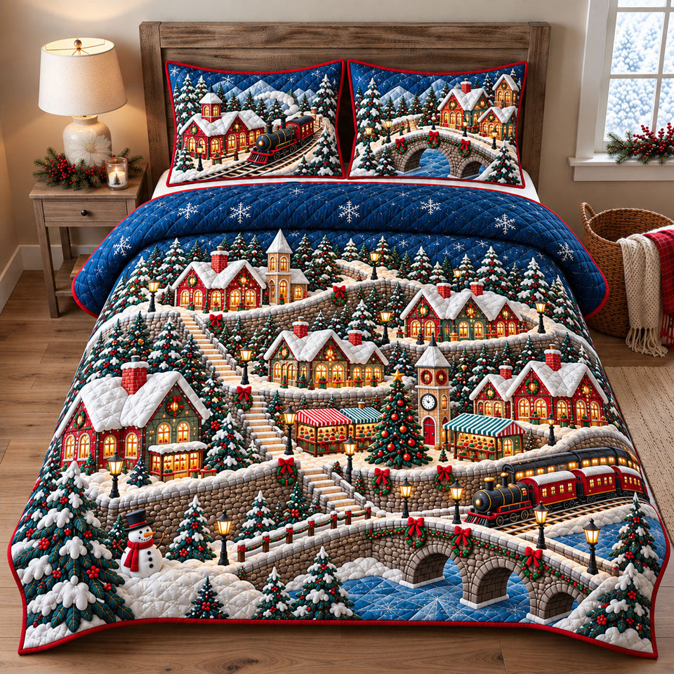 Christmas Mountain Railway quilted bedding set, quilt and two pillow shams on a made bed