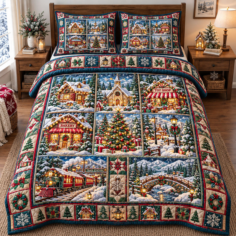 Christmas Village in Charcoal quilted bedding set, quilt and two pillow shams on a made bed