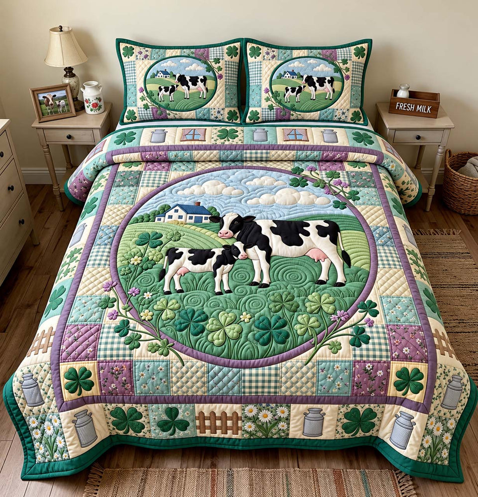 Clover Meadow Cows quilted bedding set, quilt and two pillow shams on a made bed